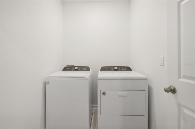 washroom featuring washer and dryer