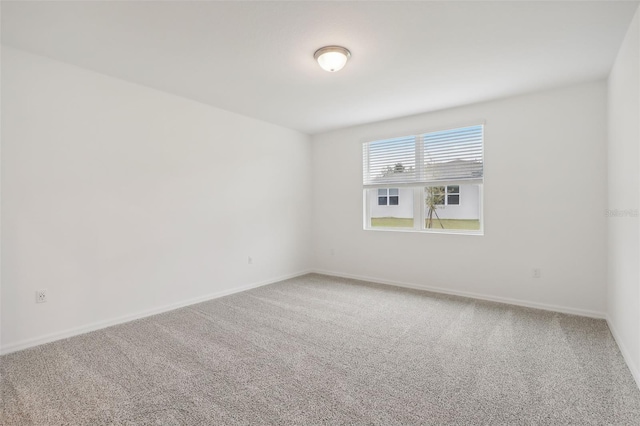 unfurnished room with carpet