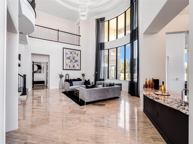 living room featuring a high ceiling