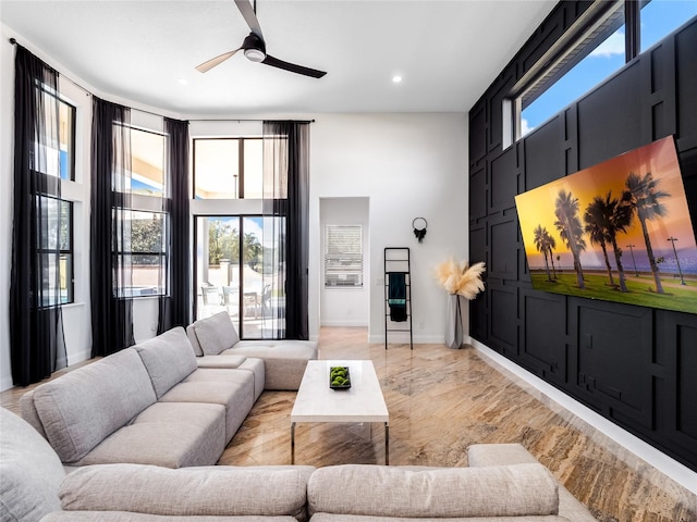 living room featuring ceiling fan