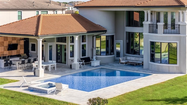 rear view of house featuring a patio area, ceiling fan, and area for grilling