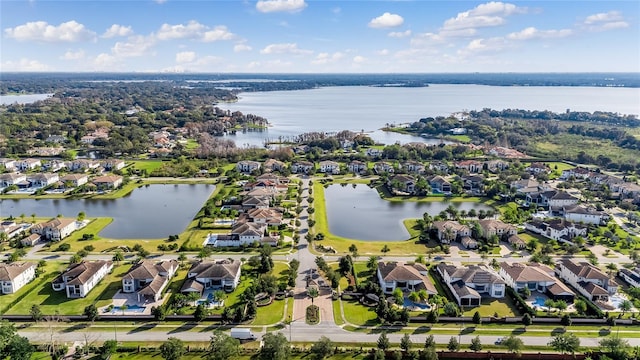 drone / aerial view with a water view