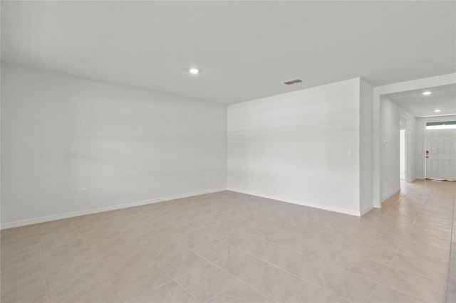 empty room featuring light tile patterned flooring