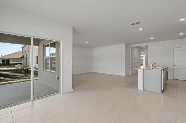 empty room with light tile patterned floors