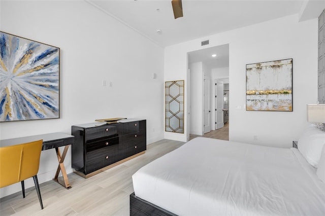 bedroom featuring light hardwood / wood-style flooring and ceiling fan