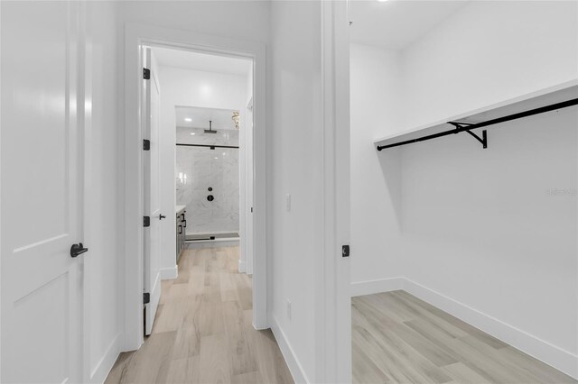 hallway featuring light wood-type flooring