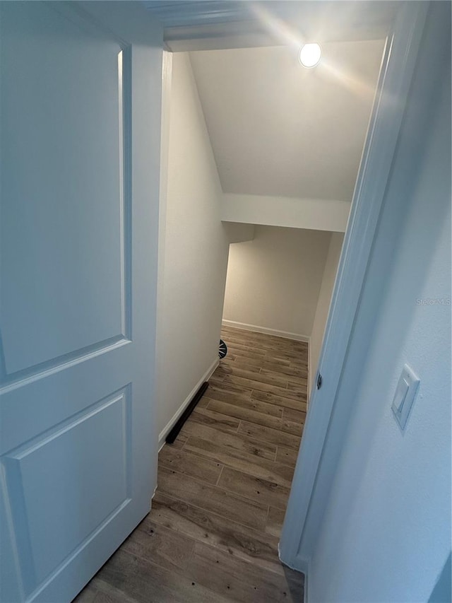 corridor featuring dark hardwood / wood-style floors