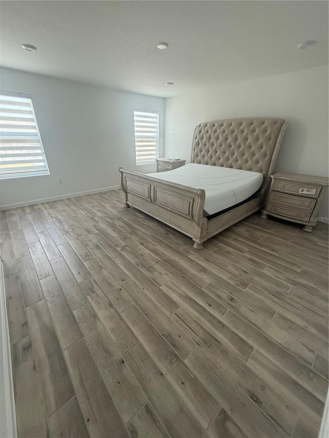 bedroom with light hardwood / wood-style flooring