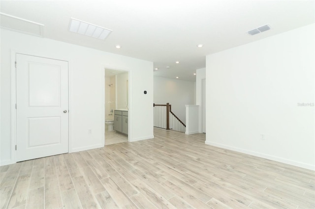 empty room with light wood-type flooring