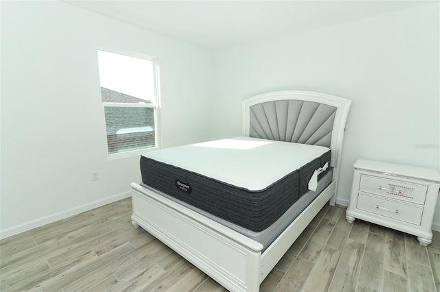 bedroom featuring light hardwood / wood-style flooring