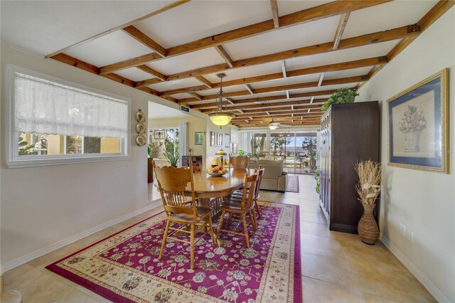 tiled dining space featuring a wealth of natural light