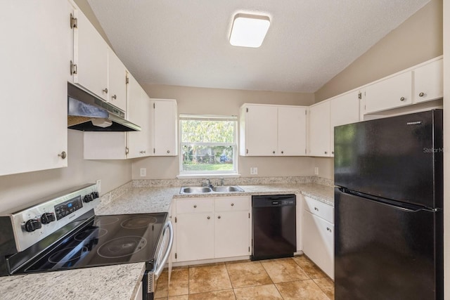 kitchen featuring white cabinetry, sink, black appliances, and vaulted ceiling