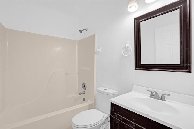 full bathroom featuring vanity,  shower combination, and toilet