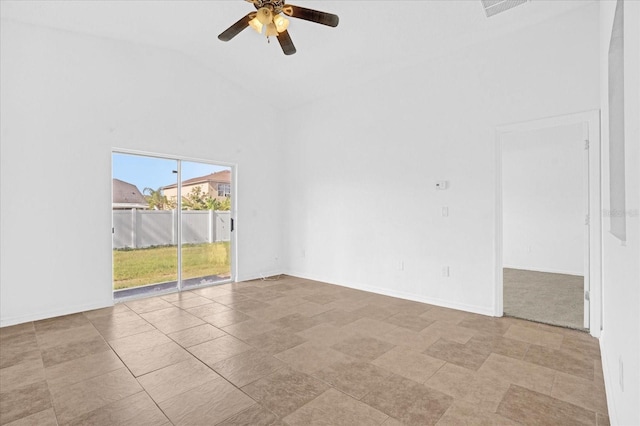 interior space featuring ceiling fan and vaulted ceiling