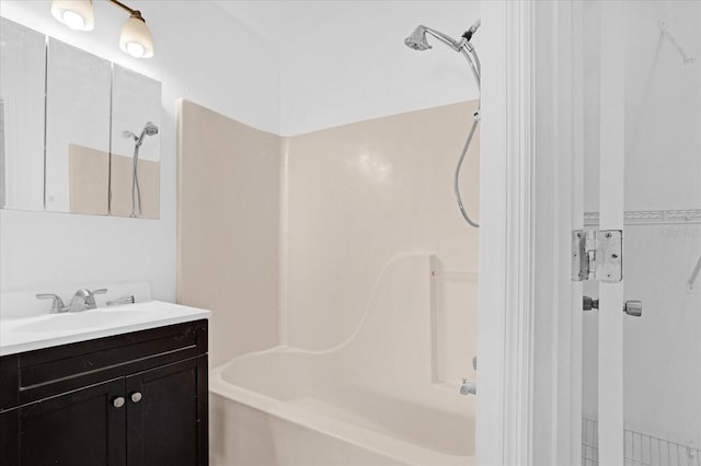 bathroom with vanity and bathtub / shower combination