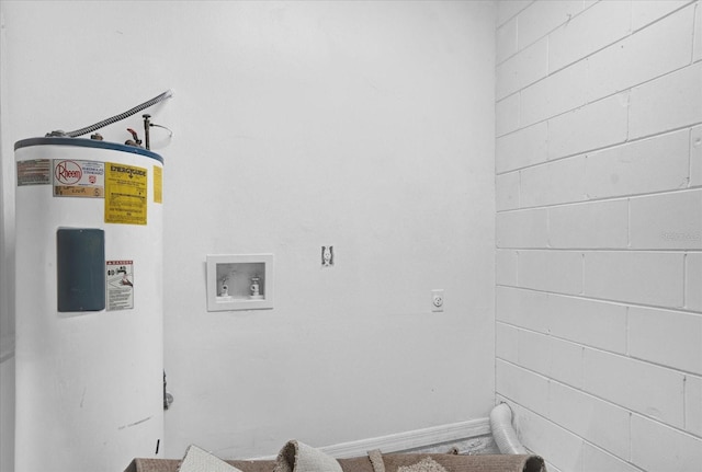 laundry area with hookup for a washing machine, electric dryer hookup, and water heater