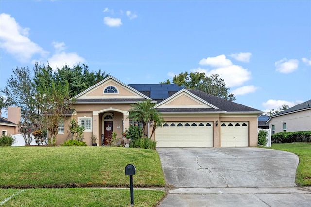 view of front facade featuring solar panels, a garage, and a front lawn