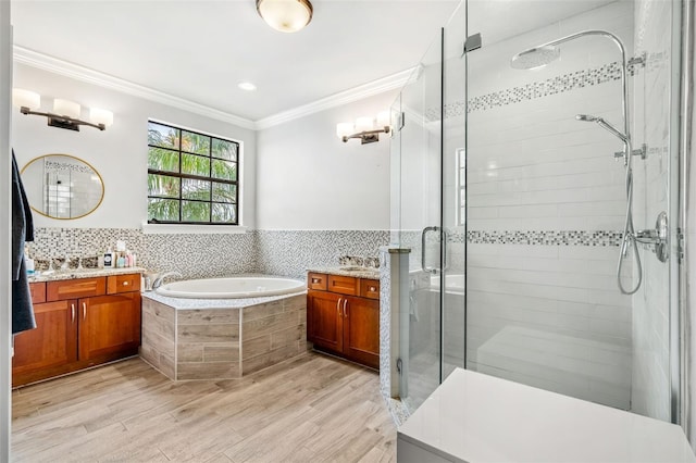 bathroom with vanity, wood-type flooring, and crown molding