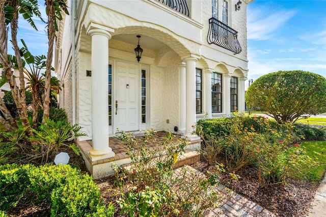 doorway to property with a balcony