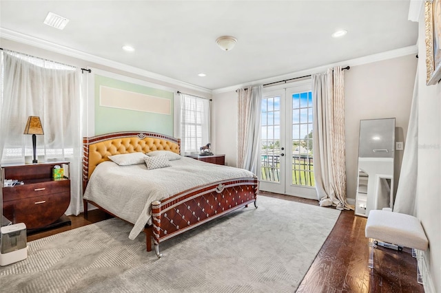 bedroom with access to exterior, french doors, crown molding, and wood-type flooring