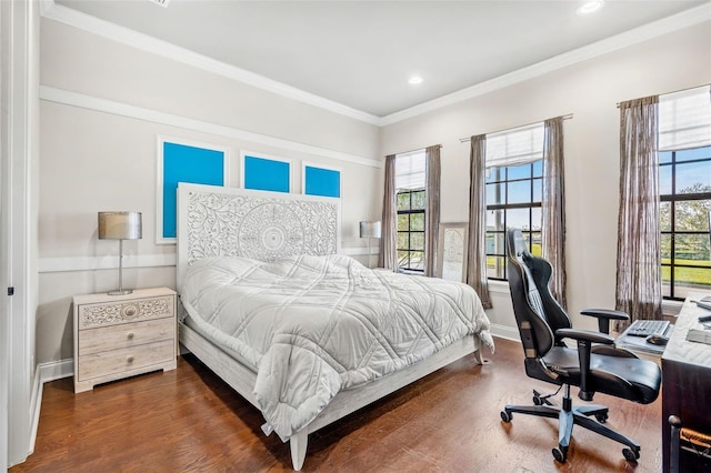 bedroom featuring dark hardwood / wood-style floors and ornamental molding