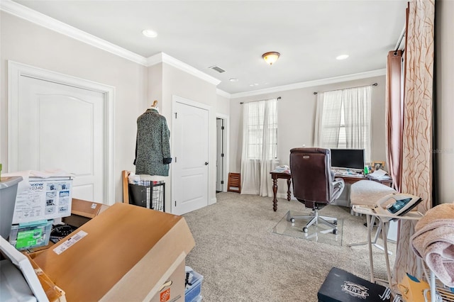 carpeted home office featuring crown molding