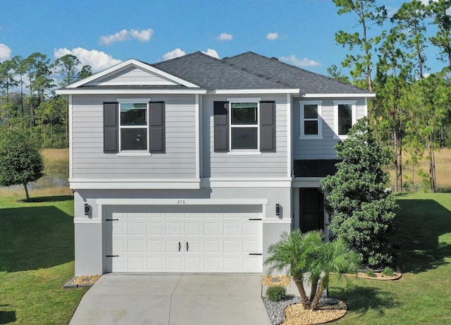 view of front facade featuring a garage and a front lawn