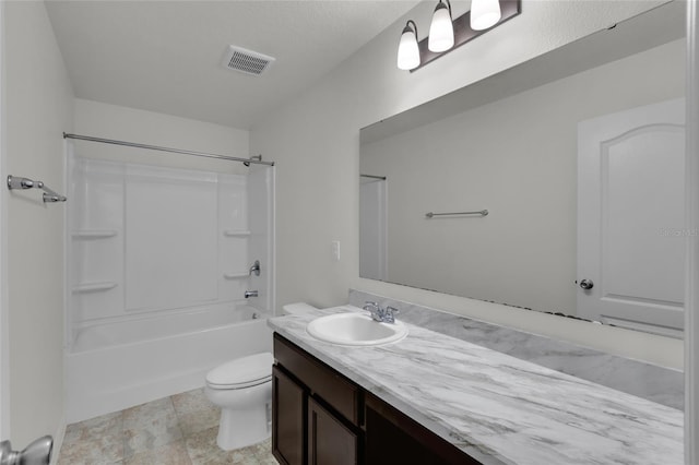 full bathroom with bathtub / shower combination, vanity, and toilet