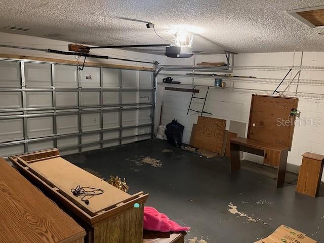 garage with a garage door opener