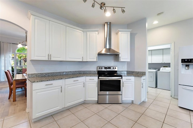 kitchen featuring white cabinets, electric range, and wall chimney exhaust hood