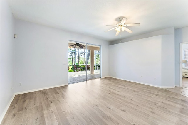 unfurnished room featuring ceiling fan and light wood-type flooring