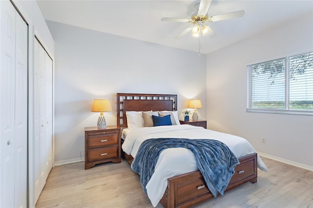 bedroom with light wood-type flooring and ceiling fan