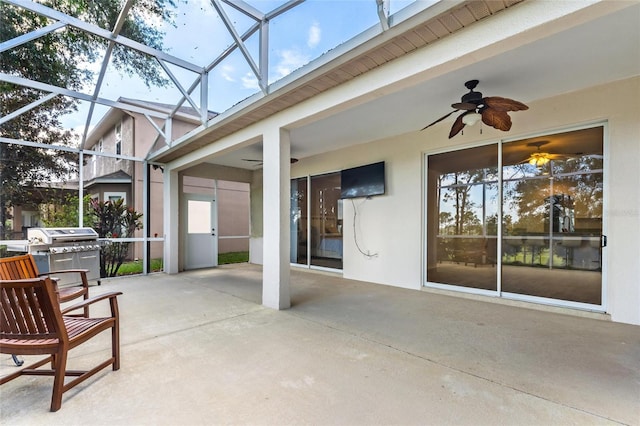 sunroom / solarium with ceiling fan and a healthy amount of sunlight