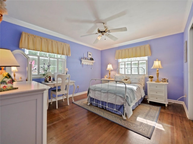 bedroom featuring ceiling fan, dark hardwood / wood-style flooring, and crown molding