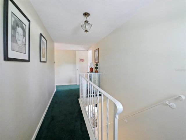 hallway featuring carpet floors