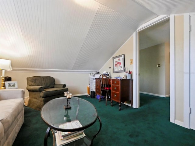 office area featuring dark carpet and vaulted ceiling