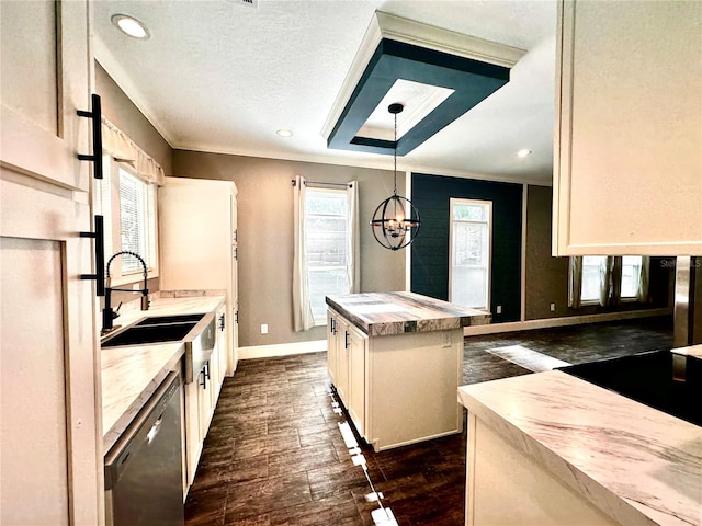 kitchen with a center island, hanging light fixtures, stainless steel dishwasher, dark hardwood / wood-style flooring, and a chandelier