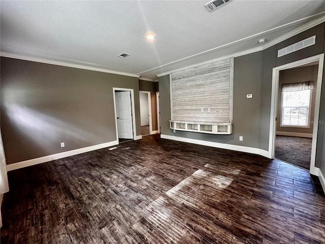 interior space featuring crown molding and dark wood-type flooring