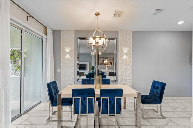 dining space with a notable chandelier