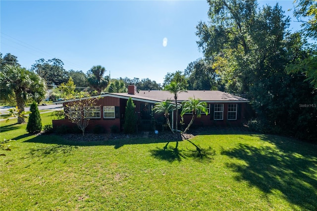 exterior space with a lawn