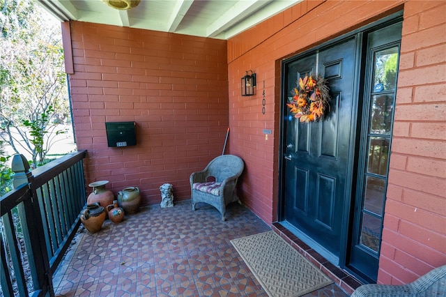 doorway to property featuring a balcony