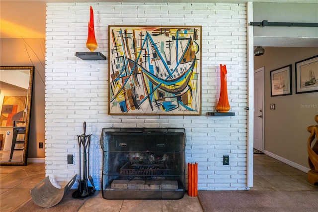 interior details featuring tile patterned floors and a fireplace