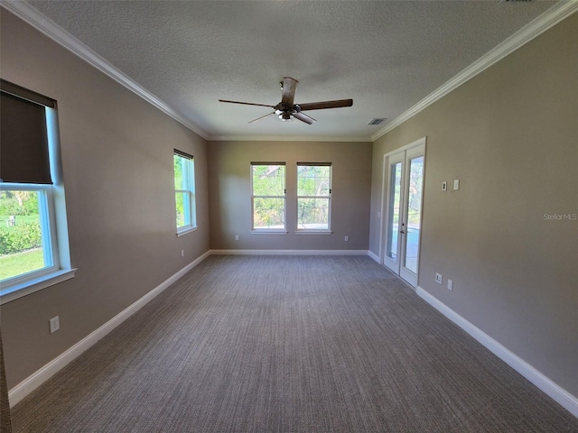 unfurnished room featuring french doors, a textured ceiling, ceiling fan, and crown molding