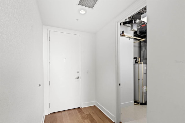 hall featuring light hardwood / wood-style floors