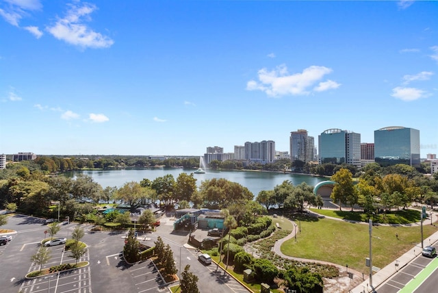 birds eye view of property with a water view