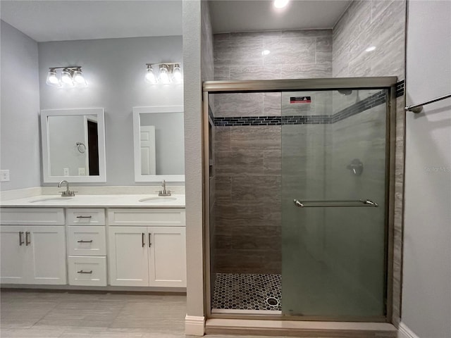 bathroom featuring vanity and walk in shower