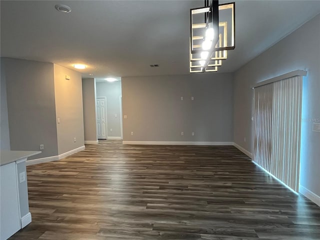 interior space featuring dark wood-type flooring