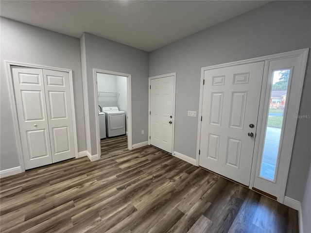 entryway featuring dark hardwood / wood-style floors and washer / dryer