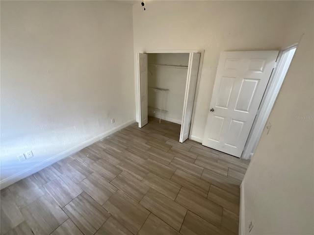 unfurnished bedroom with a closet