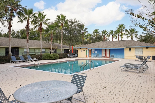 view of pool featuring a patio area